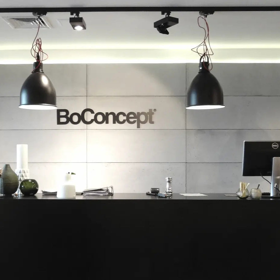 Decorative Industrial Concrete Wall Panels Interior behind reception desk closeup ANTHRACITE DecorMania.eu