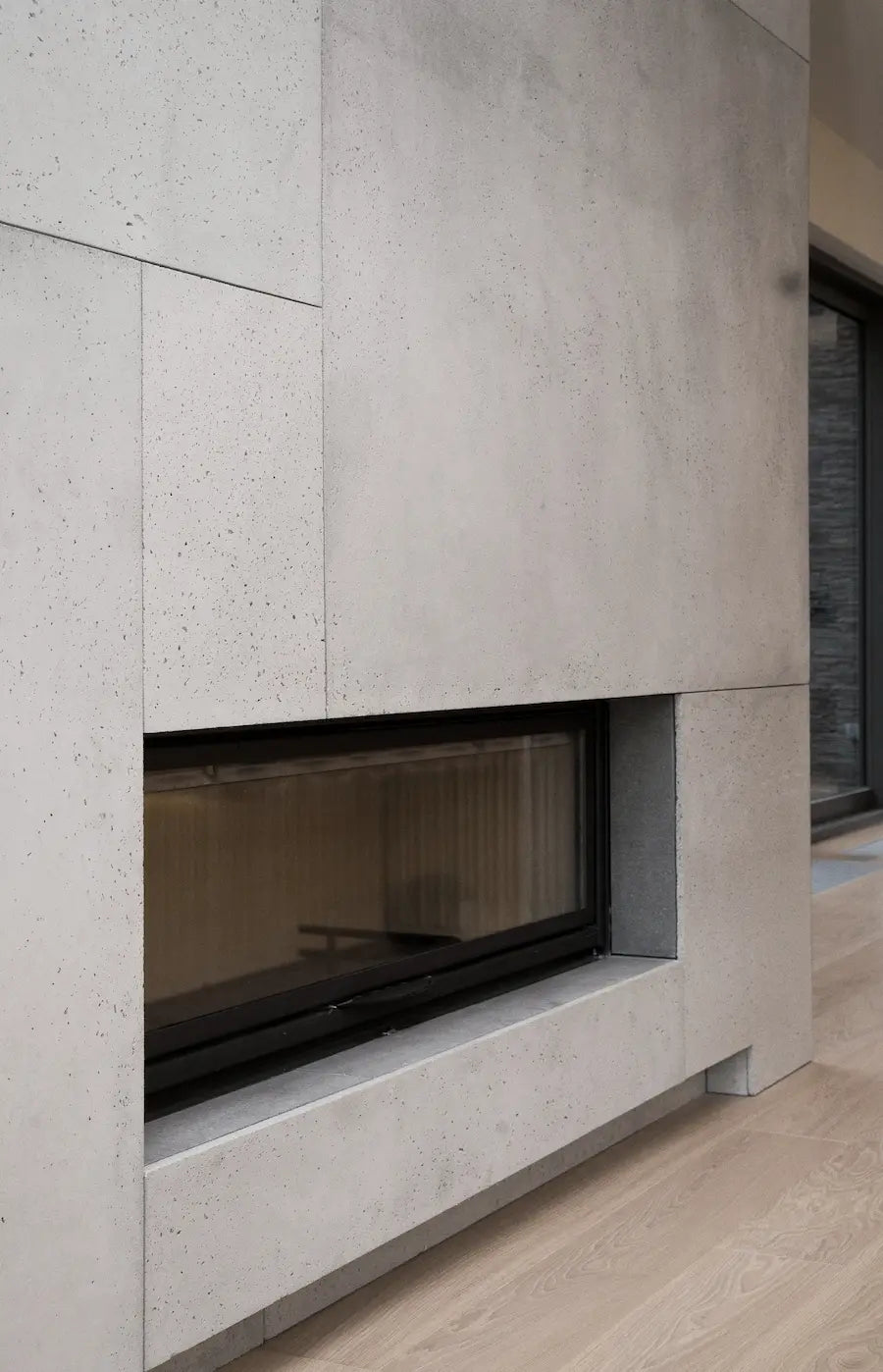 Decorative Industrial Concrete Wall Panels Interior NEUTRAL framing the fireplace DecorMania.eu