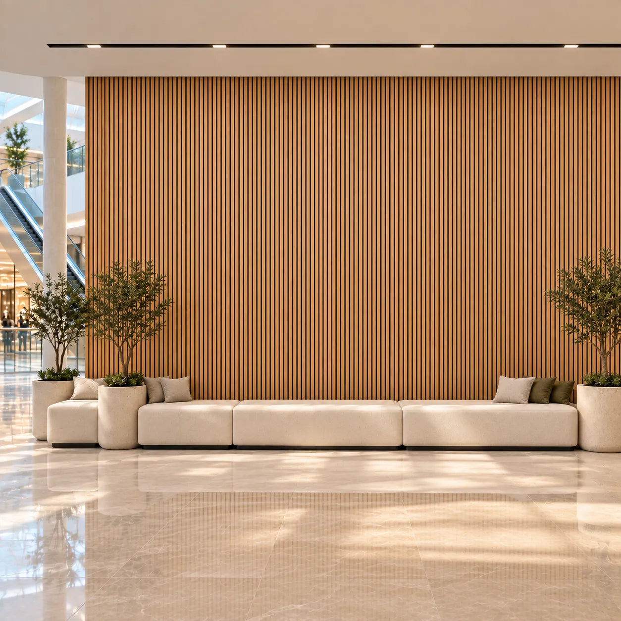 Natural oak fire rated acoustic slat panels installed in a modern shopping centre seating area