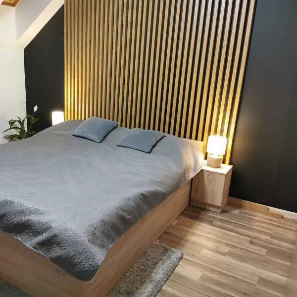 Acoustic Slatted Wall Panels Golden in bedroom interior DecorMania.eu