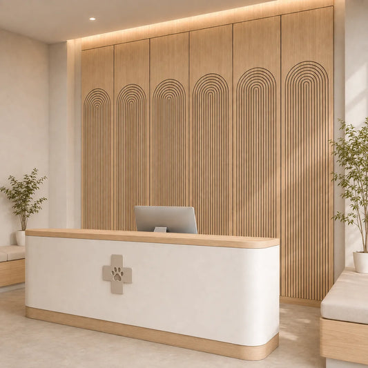 Angled view of a veterinary clinic reception with oak acoustic panels and a paw cross symbol