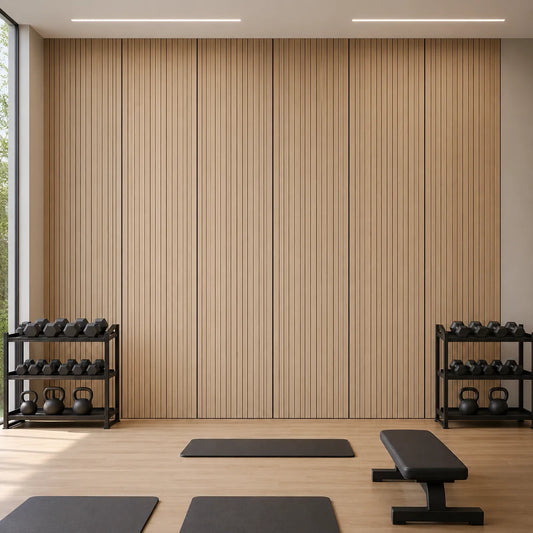 Front view of a fitness studio featuring oak veneer MDF acoustic wall panels with vertical black grooves