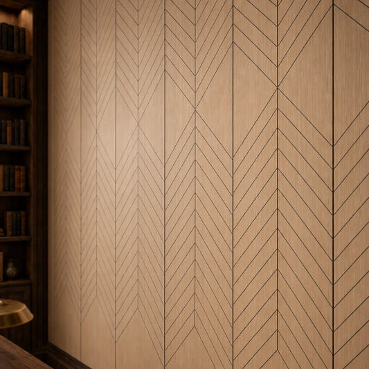 Close-up of natural oak GrooveCraft milled MDF acoustic wall panels showing black chevron grooves and wood grain
