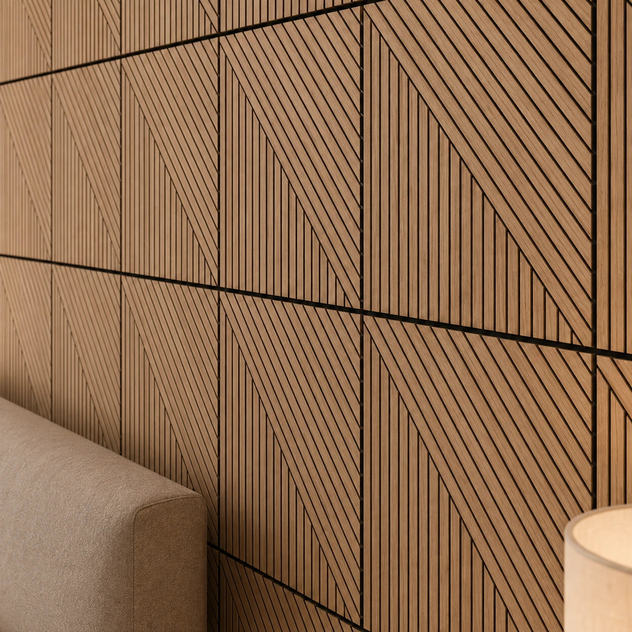 Close-up of geometric oak wall panels with vertical and diagonal grooves, black recessed lines and precise square joints