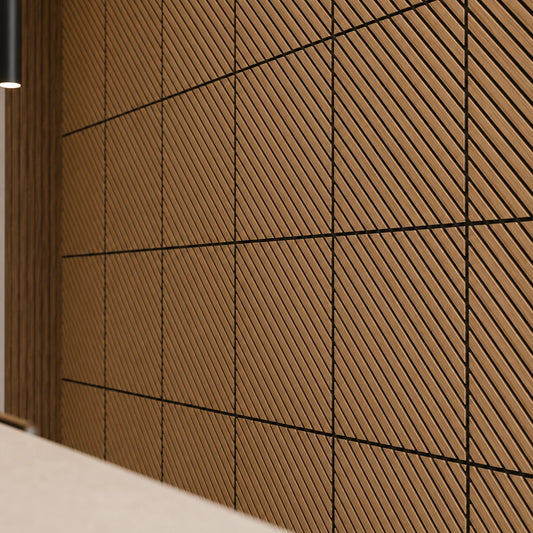 Close-up of oak veneer MDF acoustic wall panels showing diagonal grooves, square joints and textured relief