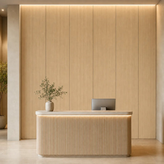 Front view of a massage studio reception with smooth oak veneer MDF wall panels and warm ambient lighting