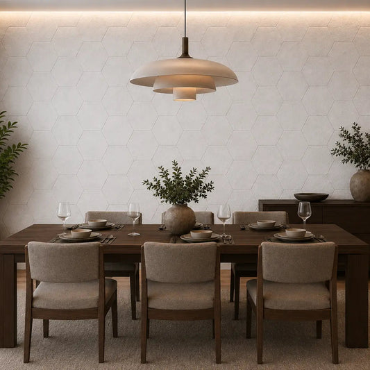White HEXA 3D felt PET wall panels in an elegant dining room with a dark wooden table, upholstered chairs and modern pendant lighting front view