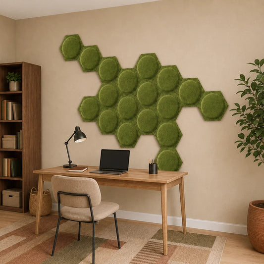Angled view of olive hexagonal 3D acoustic panels in a warm home office with wooden furniture and plants