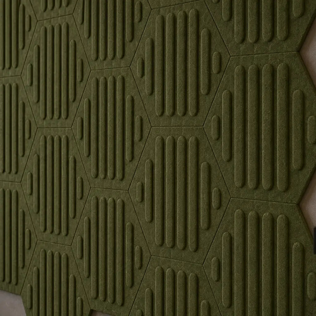 Close-up of olive HEXA RIFT 3D felt wall panels showing the raised pattern, precise joints and felt texture