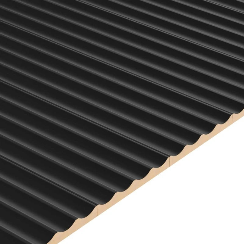Close-up of several connected black matte fluted MDF panels forming a continuous surface with evenly spaced vertical grooves.