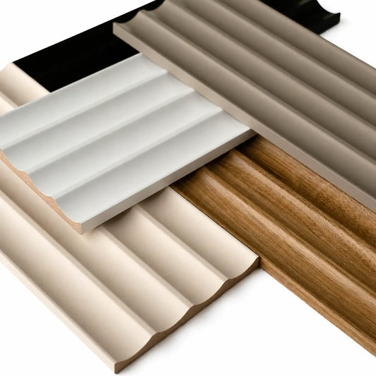 Close-up of overlapping MDF fluted panel samples showing colours, grooves and wood texture