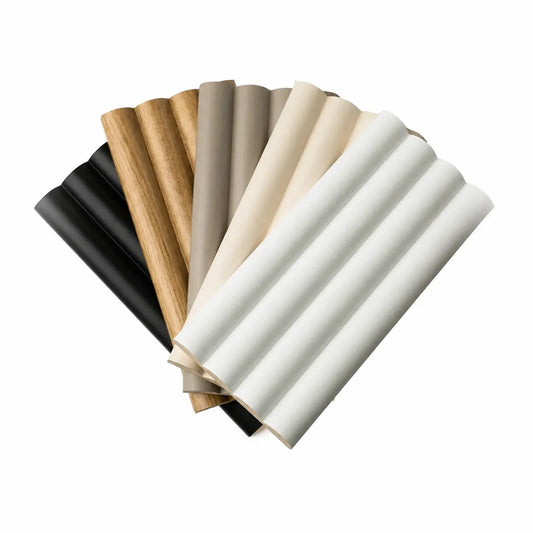 Fan-shaped display of Montero fluted wall panel samples in black, oak, taupe, beige and white
