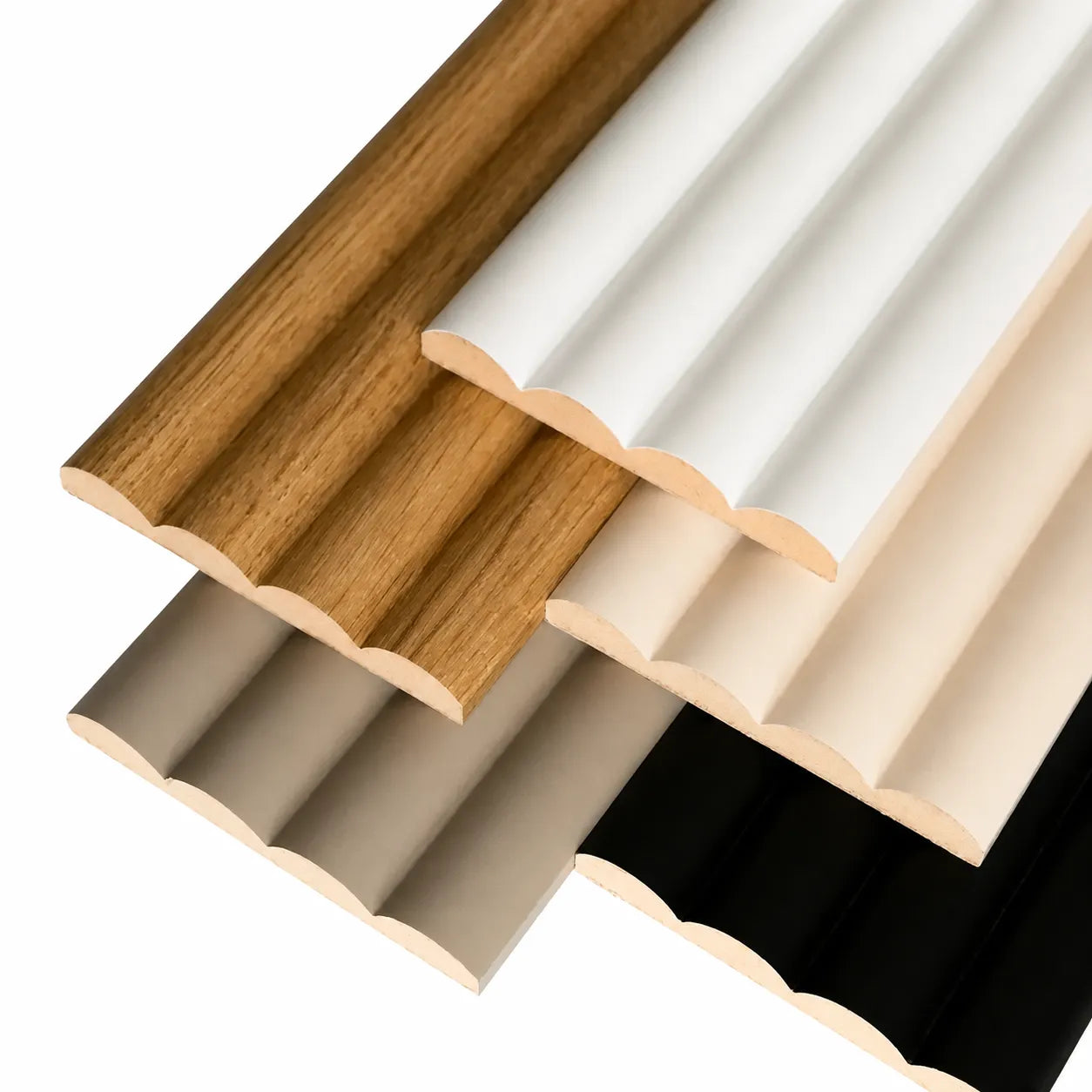 Close-up of overlapping Montero fluted wall panel samples in oak, white, beige, taupe and black
