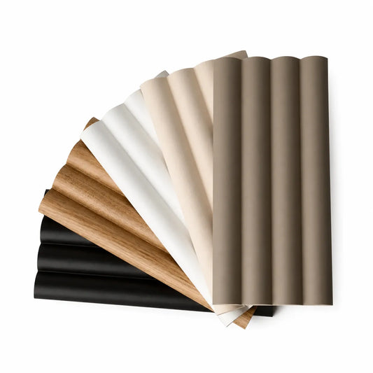 Fan arrangement of Montero decorative fluted wall panel samples in neutral colours and oak
