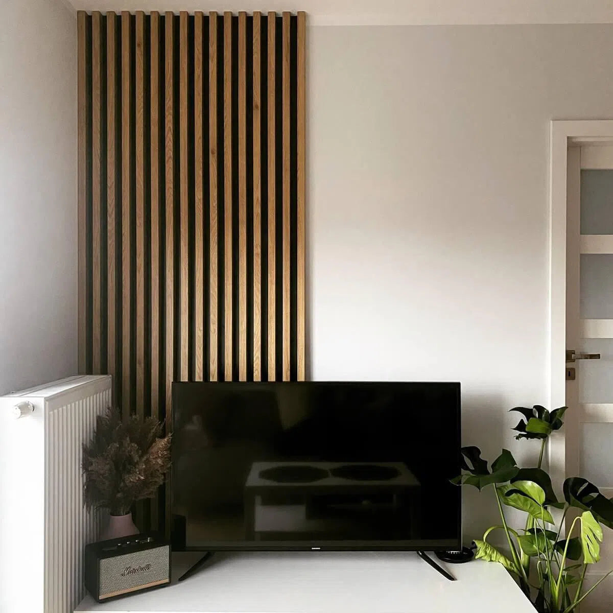OAK Veneer Acoustic Slatted Wall Panels feature wall in living room interior Decormania.eu