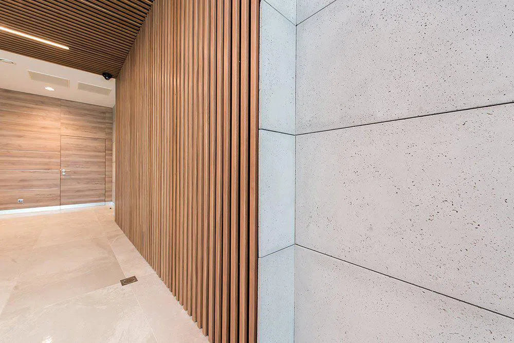 OAK Veneer Acoustic Slatted Wall Panels feature wall combined with concrete Decormania.eu