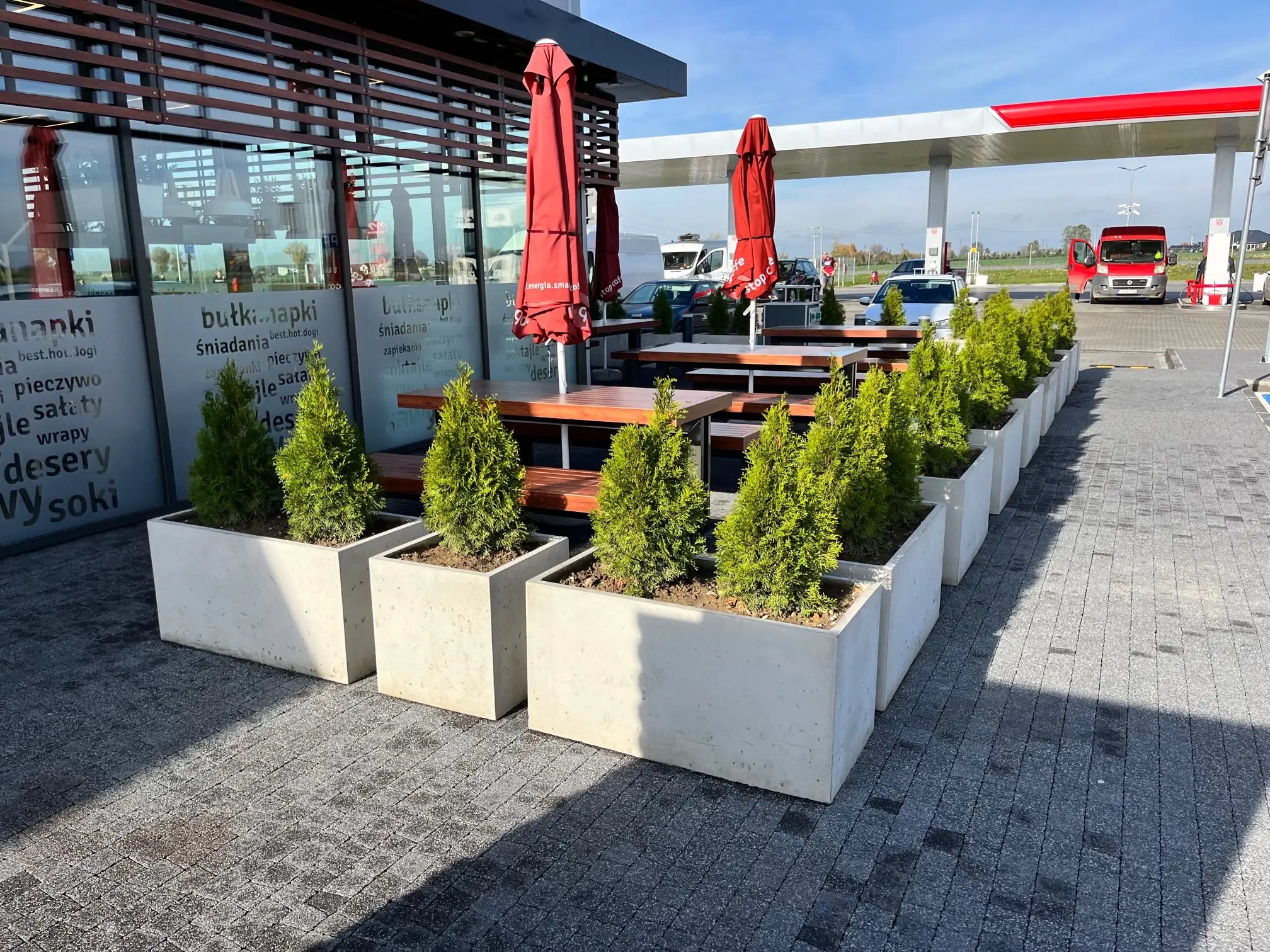 Outdoor Concrete Planters - Rectangle 50x120x50 cm in front of a gas station restaurant Decormania.eu