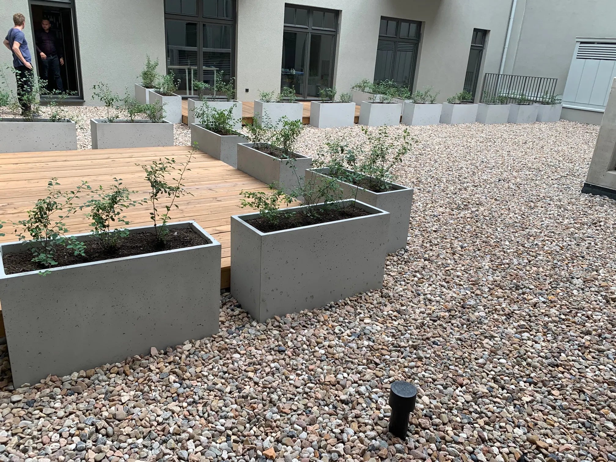 Outdoor Concrete Planters - Rectangle 50x120x50 cm in a patio outside Decormania.eu
