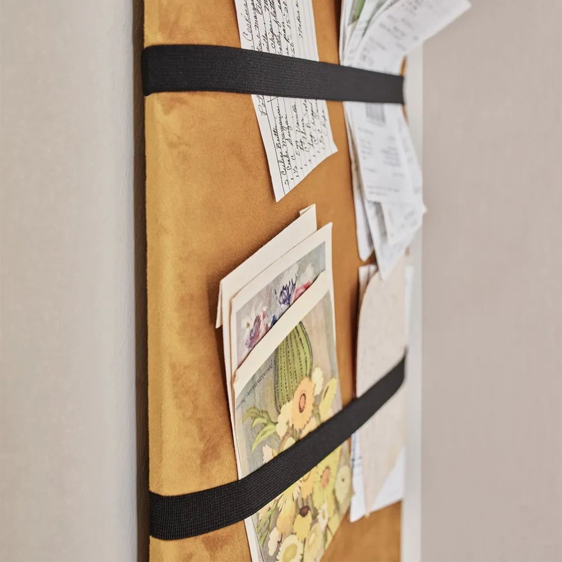 Padded Wall Boards Accessories - Elastic 15 cm black elastic on yellow mustard panel Docormania.eu