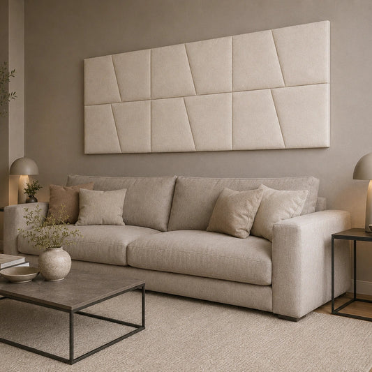 Angled view of a cream modular wall panel arranged in two rows above a sofa, showing its regular layout and geometric pattern