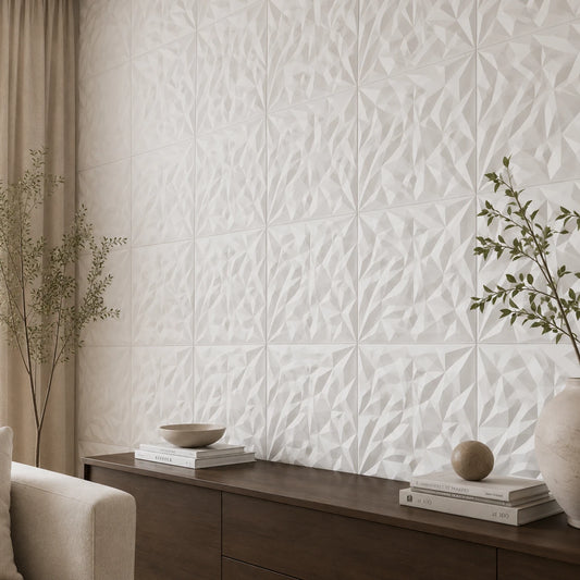 Close-up angled view of white 3D polystyrene wall panels, highlighting their crystalline relief, repeating pattern, precise joints, and subtle shadows