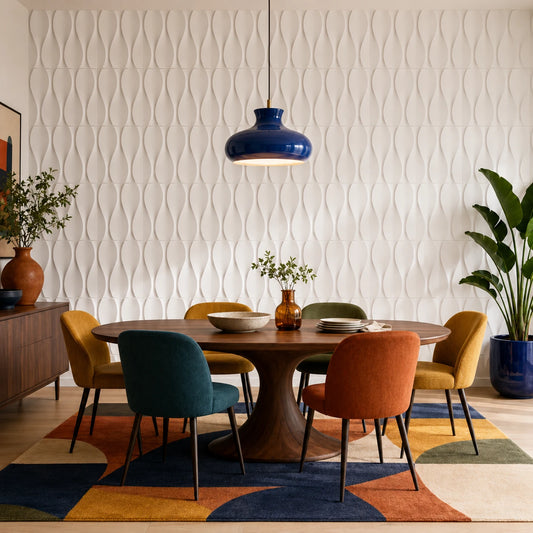 Front view of an eclectic dining room with a floor-to-ceiling wall of white hourglass-patterned 3D polystyrene panels and bold, colorful furnishings