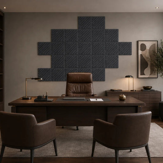 Front view of grey 3D acoustic felt wall panels with raised diagonal relief and a regular square grid