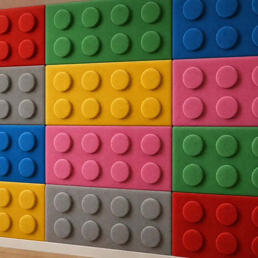 Close-up of colourful 25 × 50 cm polyurethane foam panels showing the soft velour surface and eight padded studs