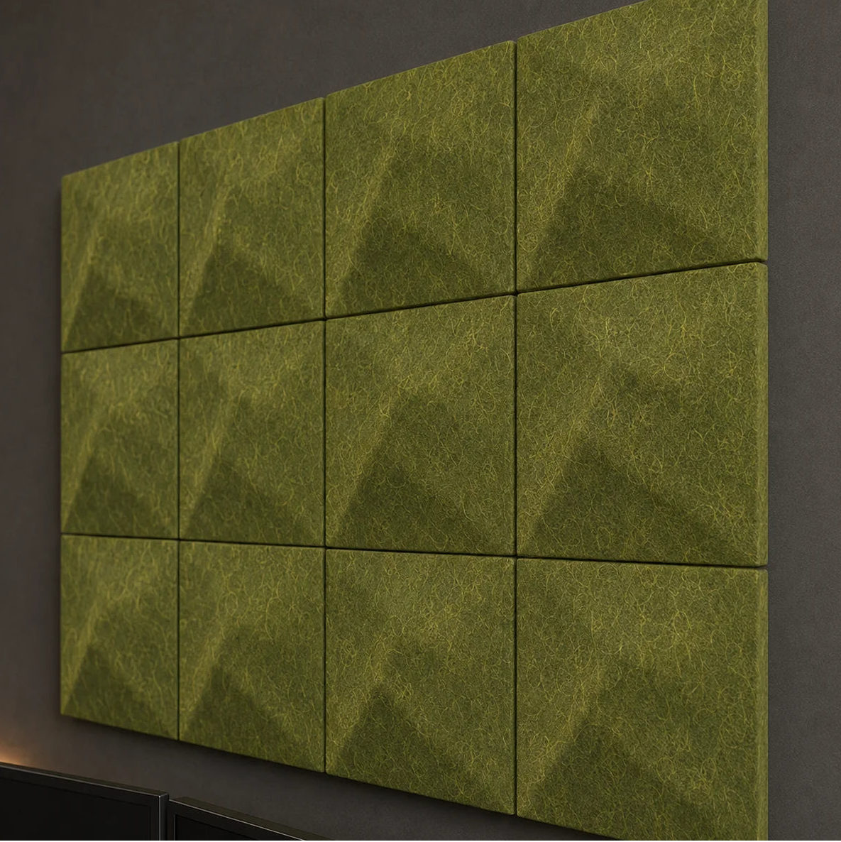 Close-up of olive 3D acoustic felt panels showing their raised TWIST pattern, even joints and textured surface