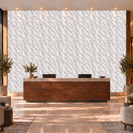 Panneaux muraux 3D en plâtre Thornwood installés derrière un comptoir de réception dans un intérieur contemporain lumineux