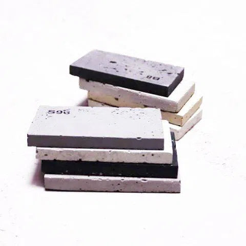 Concrete wall panel sample book on white background DecorMania.eu