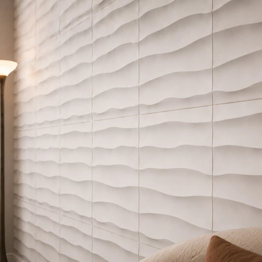 Close-up angled view of white 3D polystyrene wall panels, highlighting their smooth horizontal wave relief, precise joints, and soft shadows