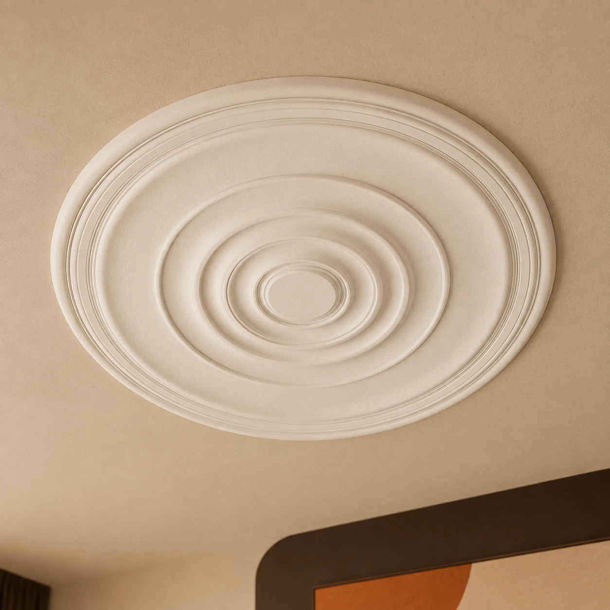 Close-up of the white Alanna ceiling rose, showing its layered concentric rings and smooth decorative relief