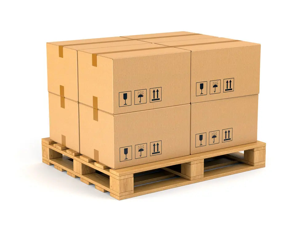 Stack of cardboard boxes on a wooden pallet with shipping labels.