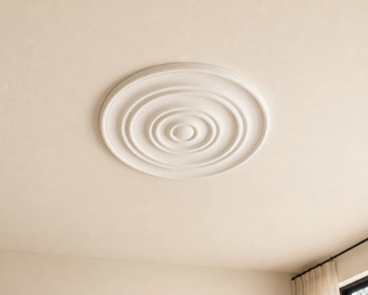 Bright neutral living room featuring a white R14 Arstyl ceiling rose with concentric rings